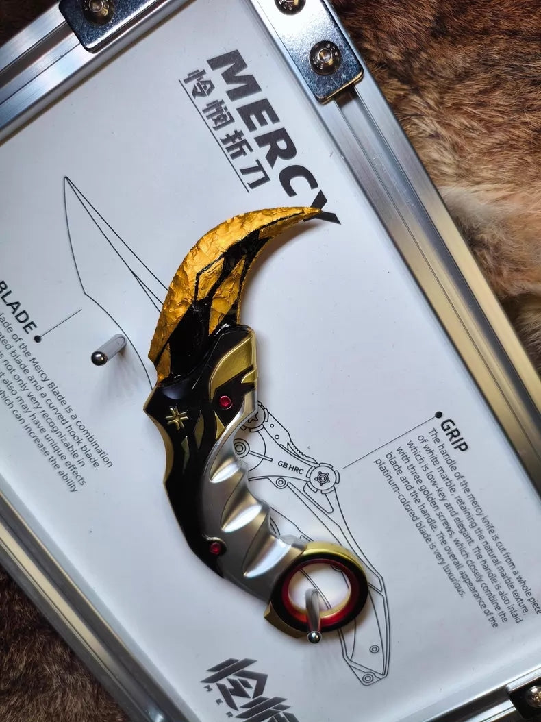 Hand-crafted stone tool replica: Valorant Champions 2021 Karambit (Mercy); obsidian-style hand-crafted stone base with a gold finish.