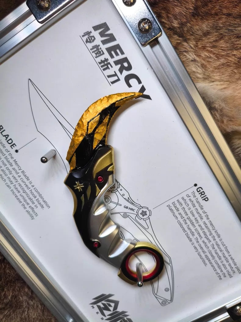 Hand-crafted stone tool replica: Valorant Champions 2021 Karambit (Mercy); obsidian-style hand-crafted stone base with a gold finish.
