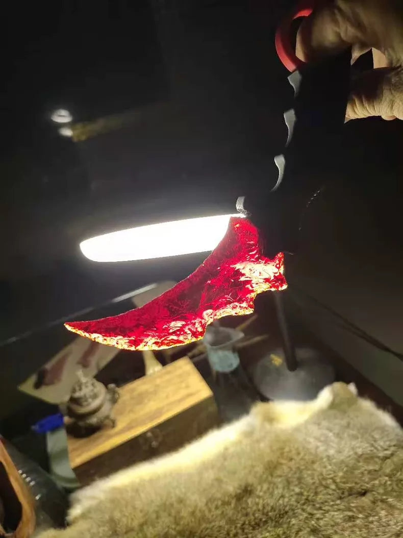 Chipped stone knife; in-stock, uniquely shaped K9 red crystal karambit.