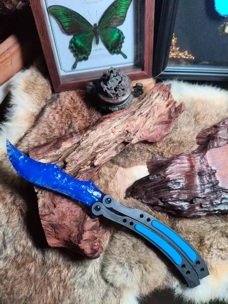 Knapped stone knife, CS:GO butterfly knife, crafted from blue opal.