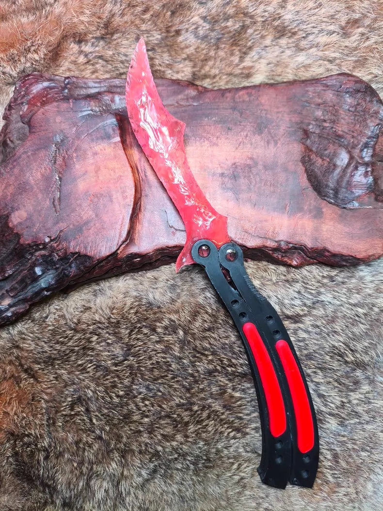 Knapped stone knife, CS:GO butterfly knife, red smelted stone blade with red gradient.
