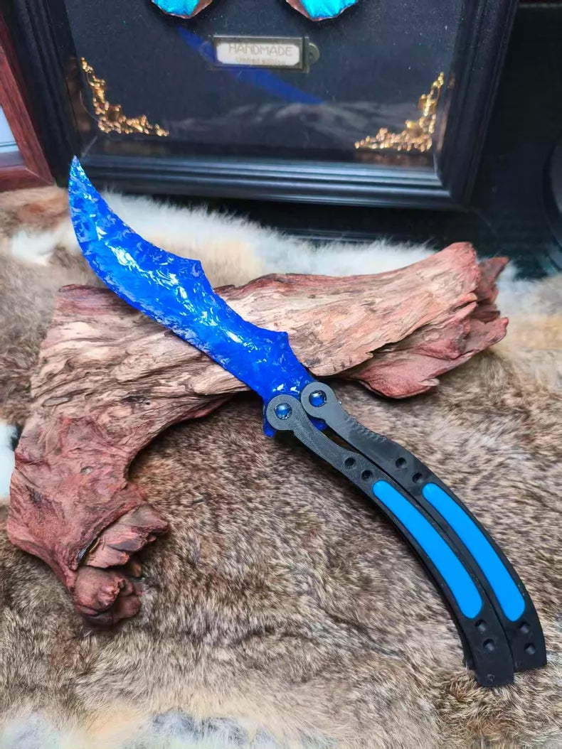 Knapped stone knife, CS:GO butterfly knife, crafted from blue opal.