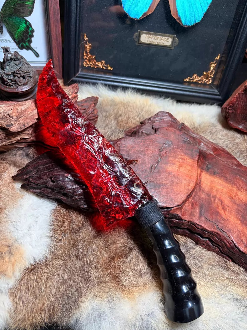 Knapped stone knife, red glass ancient-style hunting knife, flame-shaped stone blade, obsidian knife.
