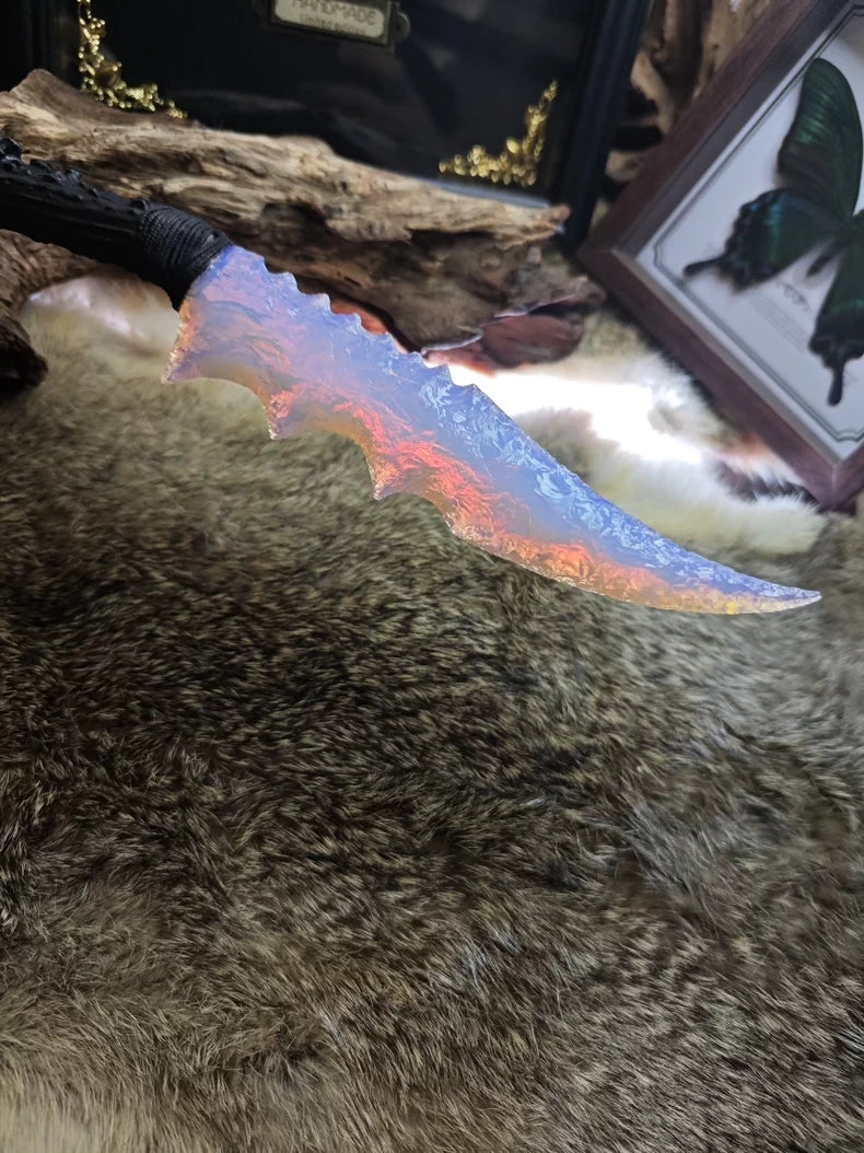 Knapped stone tools: opal and crystal knives; flame-style stone blades; obsidian knives.