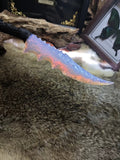 Knapped stone tools: opal and crystal knives; flame-style stone blades; obsidian knives.