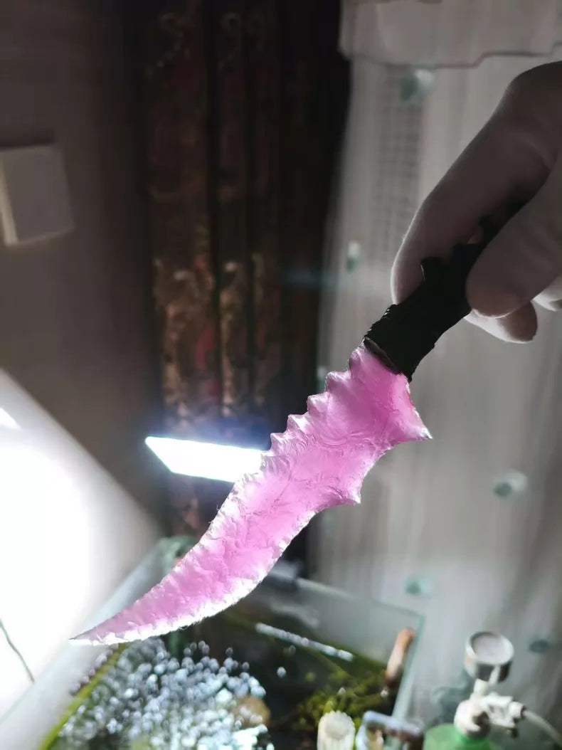 Knapped stone knives: rose quartz, "flame-style," and obsidian (dragon-crystal) blades—*Zhu Xian* series.