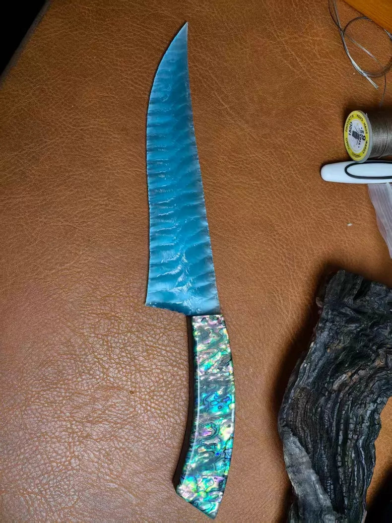 Flaked stone knife, pressure-flaked stone knife, hunting knife with a colorful shell handle and a sky-blue cat's-eye stone blade.