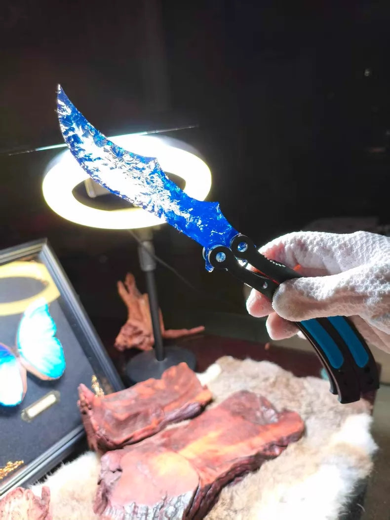 Knapped stone knife, CS:GO butterfly knife, crafted from blue opal.