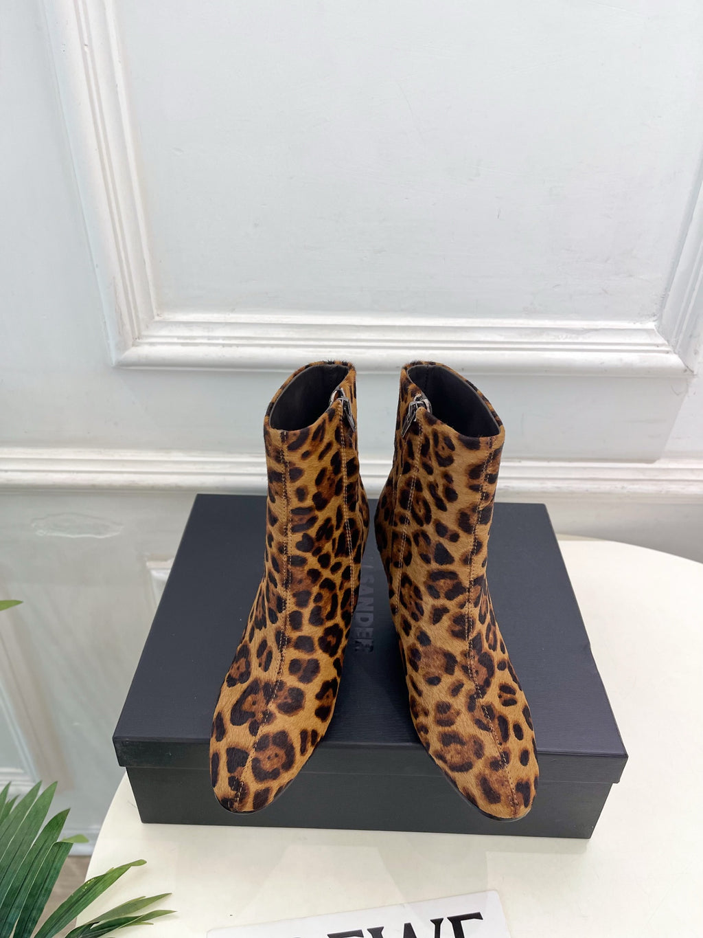 Jil Sander minimalist retro round-toe block-heel ankle boots in leopard print.