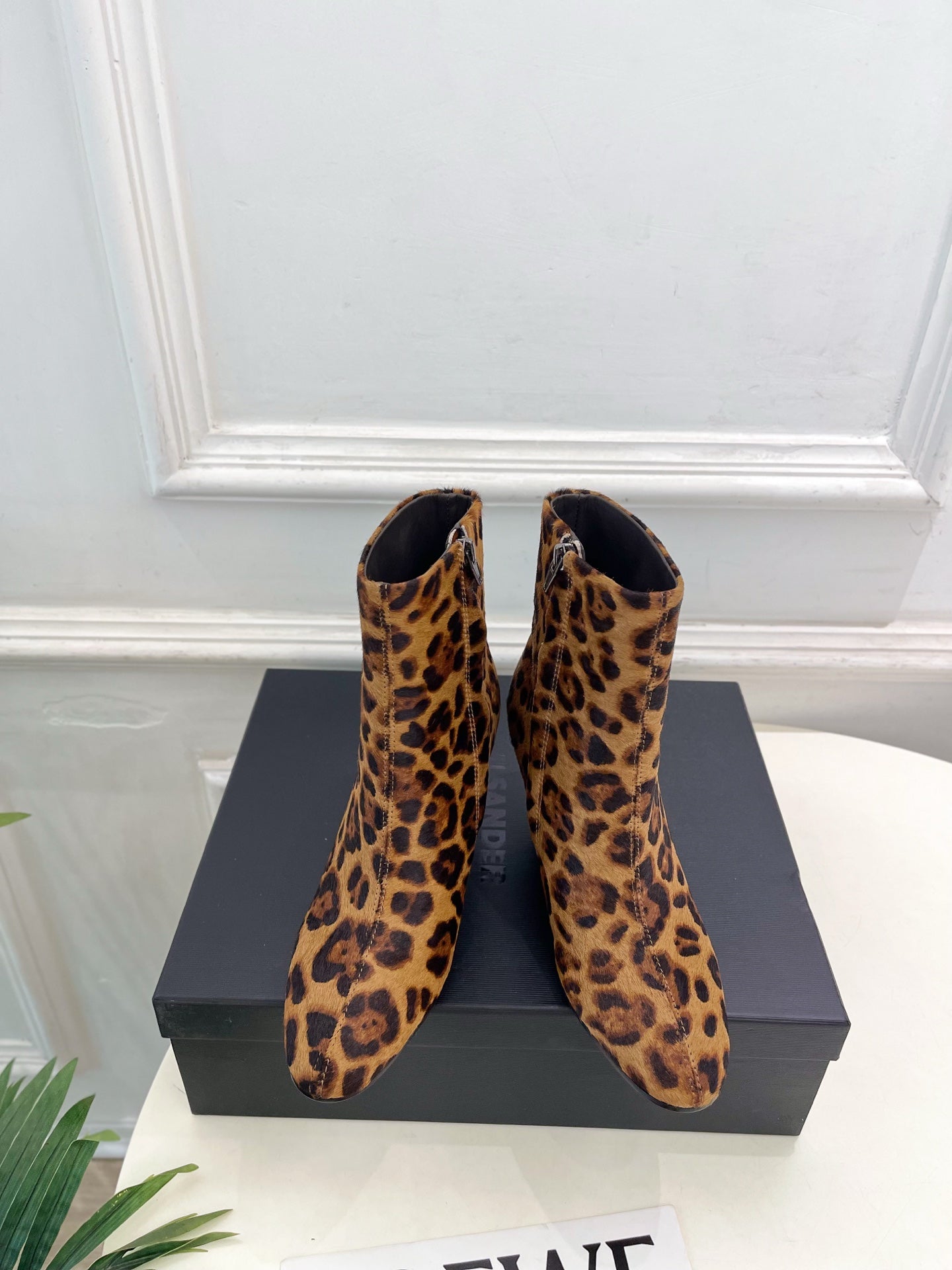 Jil Sander minimalist retro round-toe block-heel ankle boots in leopard print.