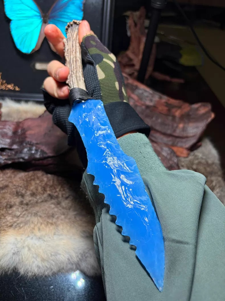 Knapped stone tools, stone knives, stone blades, hunter, blue opal knapped stone blade.
