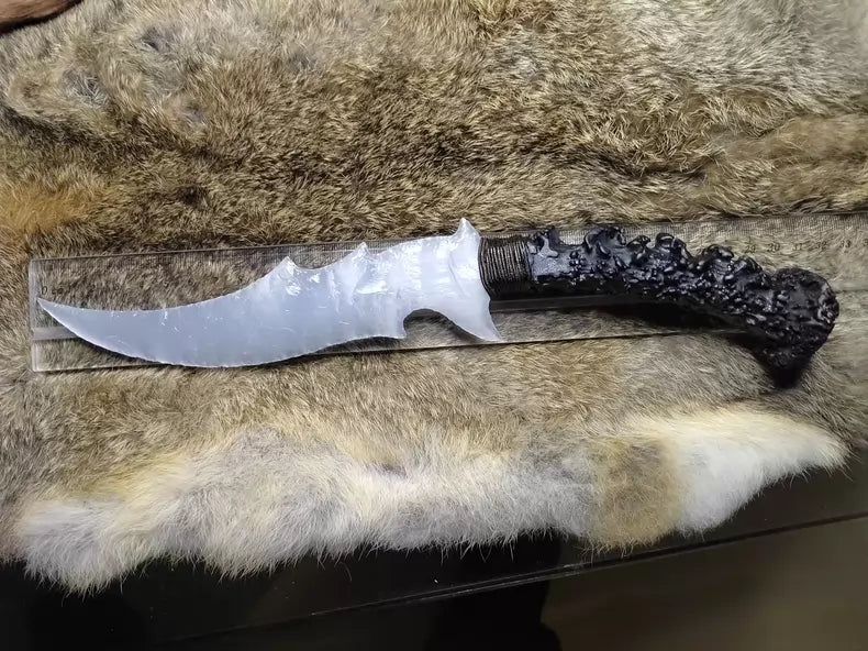 Chipped stone knife, silvery-white cat's-eye, silvery-white gemstone, flame-shaped stone blade, obsidian blade, obsidian "dragon-glass" treasure blade, "Ceremonial White Dragon"
