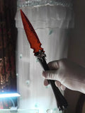 Knapped stone tool with red crystal and red glass; straight-edged stone knife/blade—new "War-Stab" series stone knife.