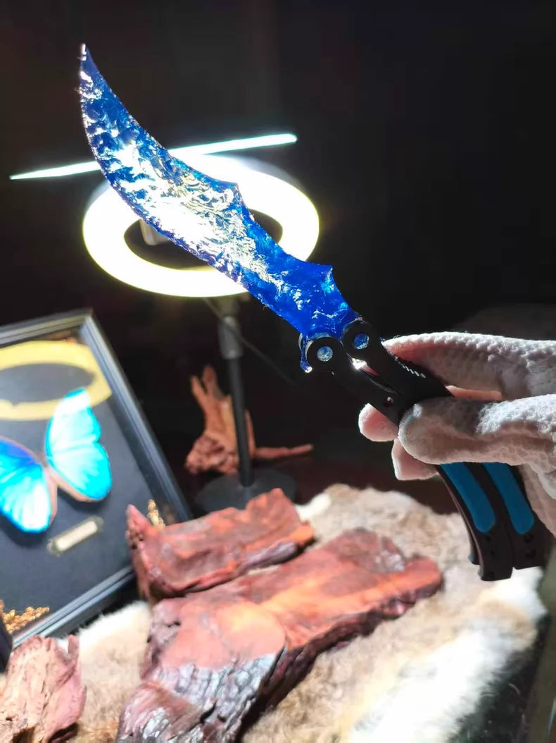 Knapped stone knife, CS:GO butterfly knife, crafted from blue opal.