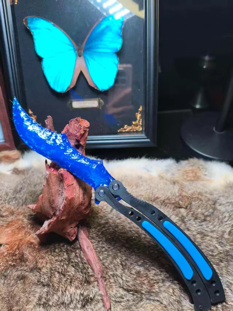 Knapped stone knife, CS:GO butterfly knife, crafted from blue opal.