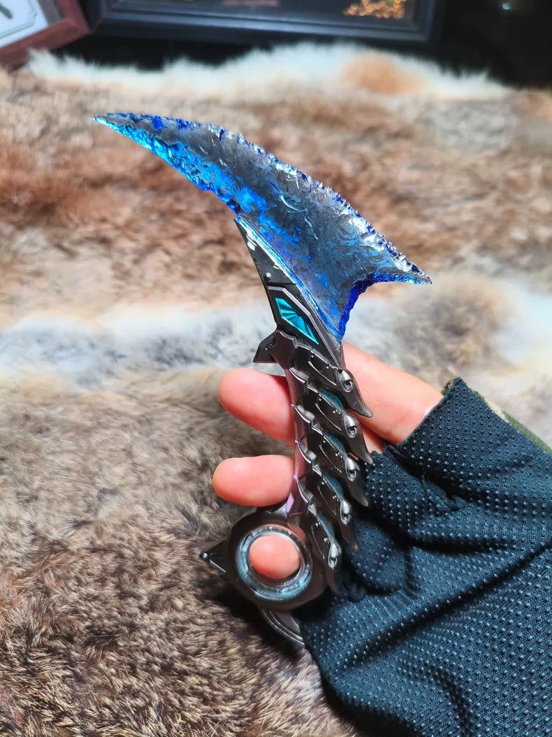 Custom-made "Chipped Stone Tool" style rotating Dilophosaurus toe-claw knife model (inspired by CS:GO/CrossFire game merchandise).