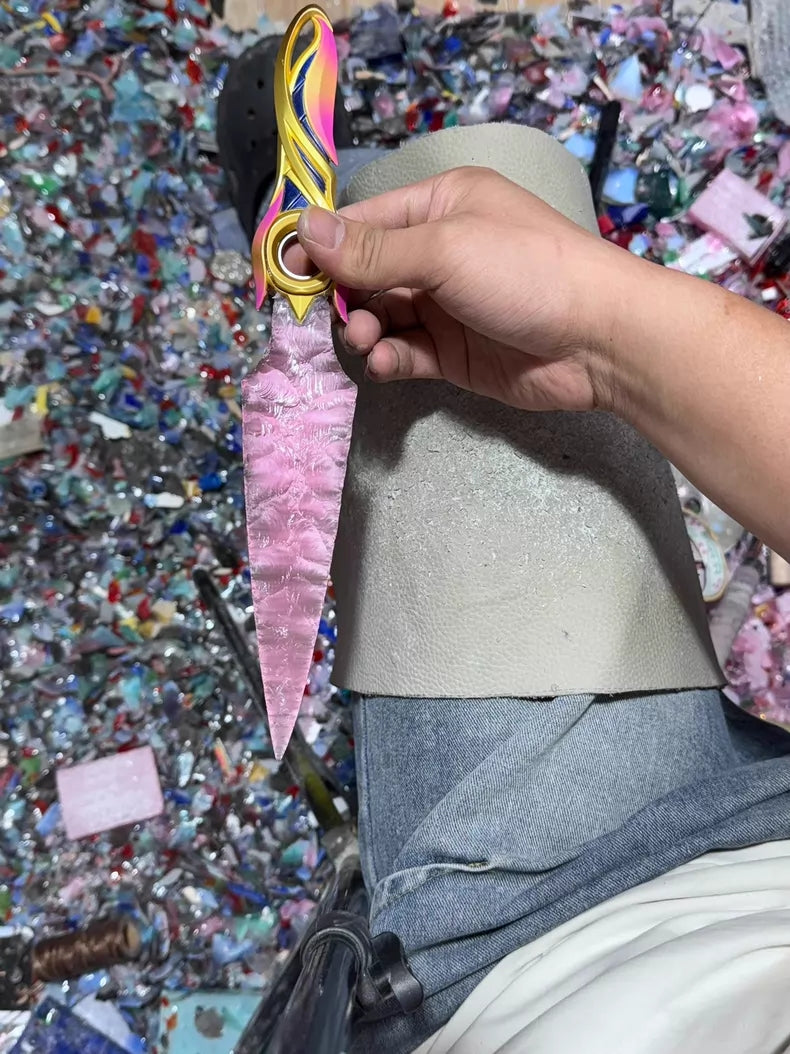 Pink cat's-eye opal blade swirling with falling blossoms