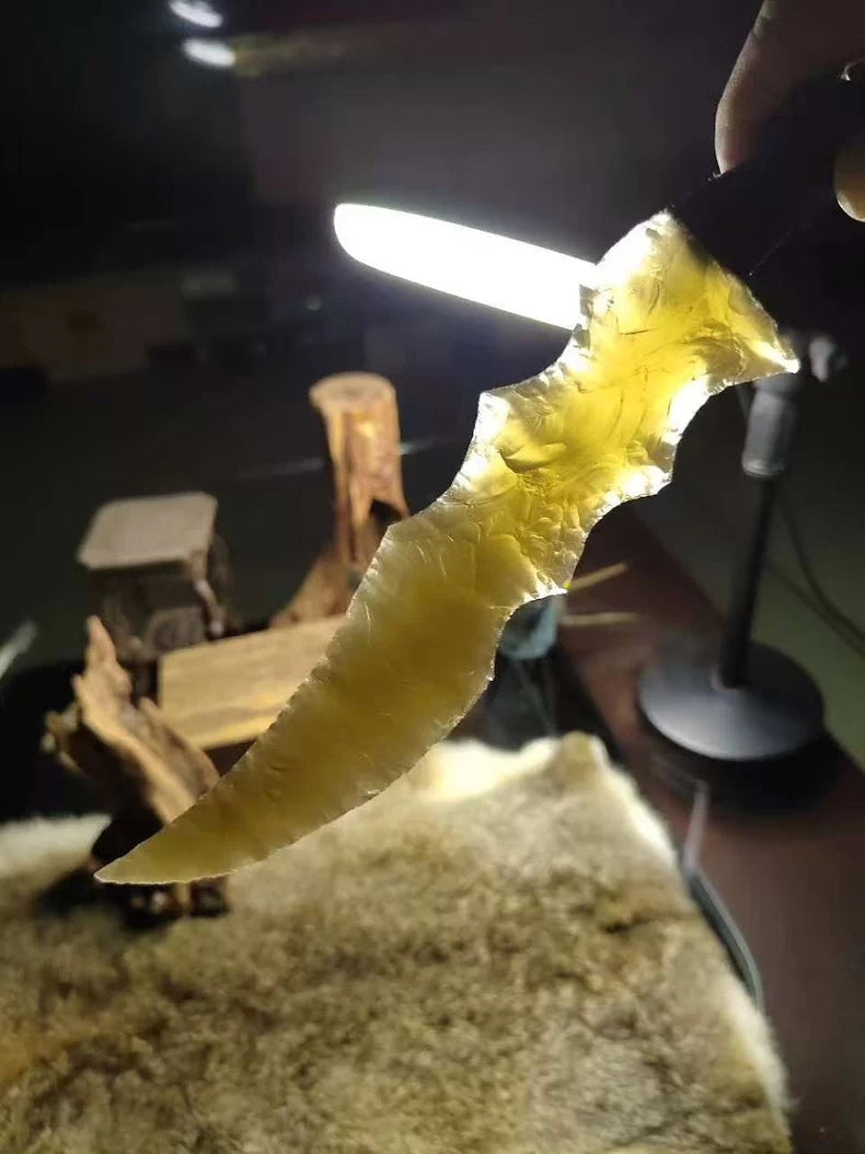 Knapped stone tools, stone knives, "Flame Blade," champagne-gold cat's-eye stone, dragon-crystal hunting knife, "Flame Blade," stone-bladed knife, obsidian knife, obsidian dragon-crystal blade — *Dragon Hunter: Gold Rush*