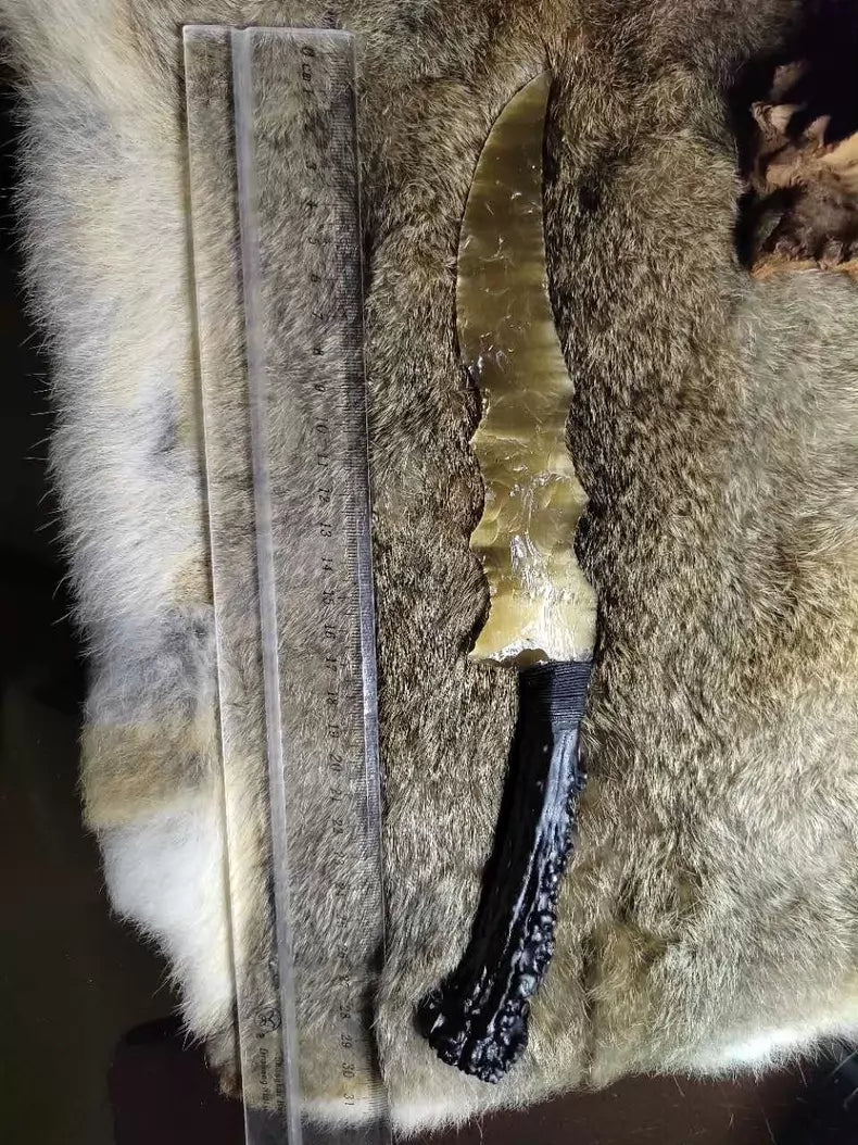 Knapped stone tools, stone knives, "Flame Blade," champagne-gold cat's-eye stone, dragon-crystal hunting knife, "Flame Blade," stone-bladed knife, obsidian knife, obsidian dragon-crystal blade — *Dragon Hunter: Gold Rush*