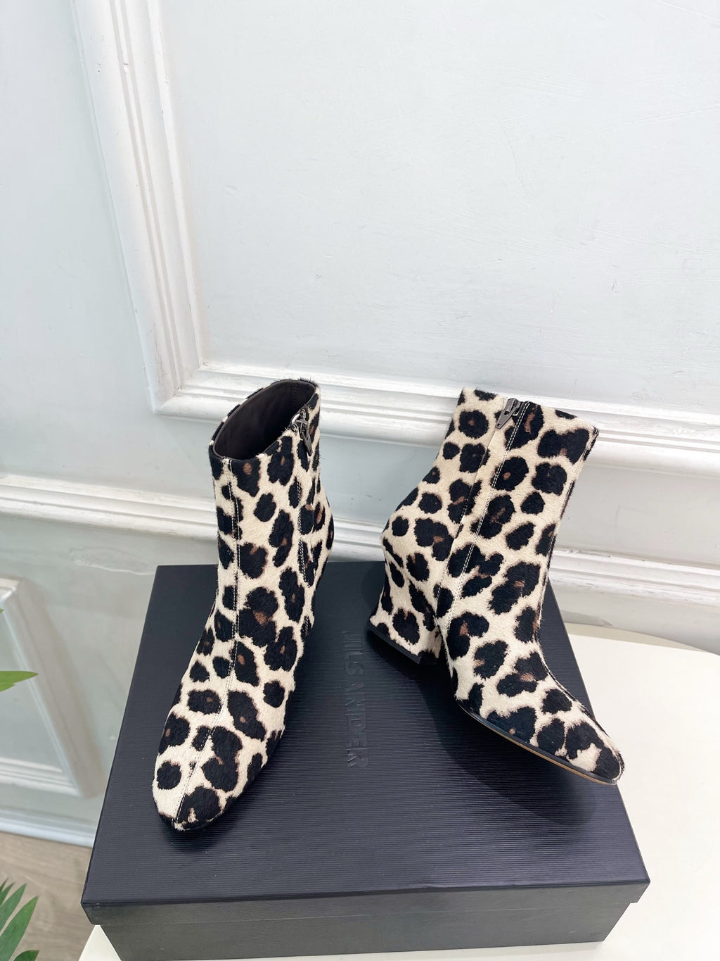 Jil Sander minimalist retro leopard-print ankle boots with round toes and block heels.