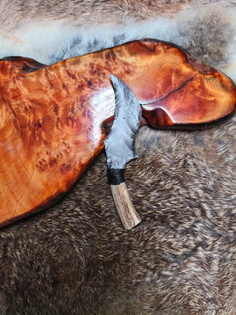 Hand-knapped stone knife for opening packages; uniquely shaped, premium silver sheen obsidian knife.