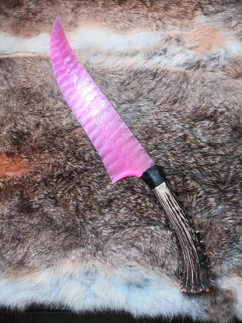 Knapped stone tool: ancient hunting knife made of opal