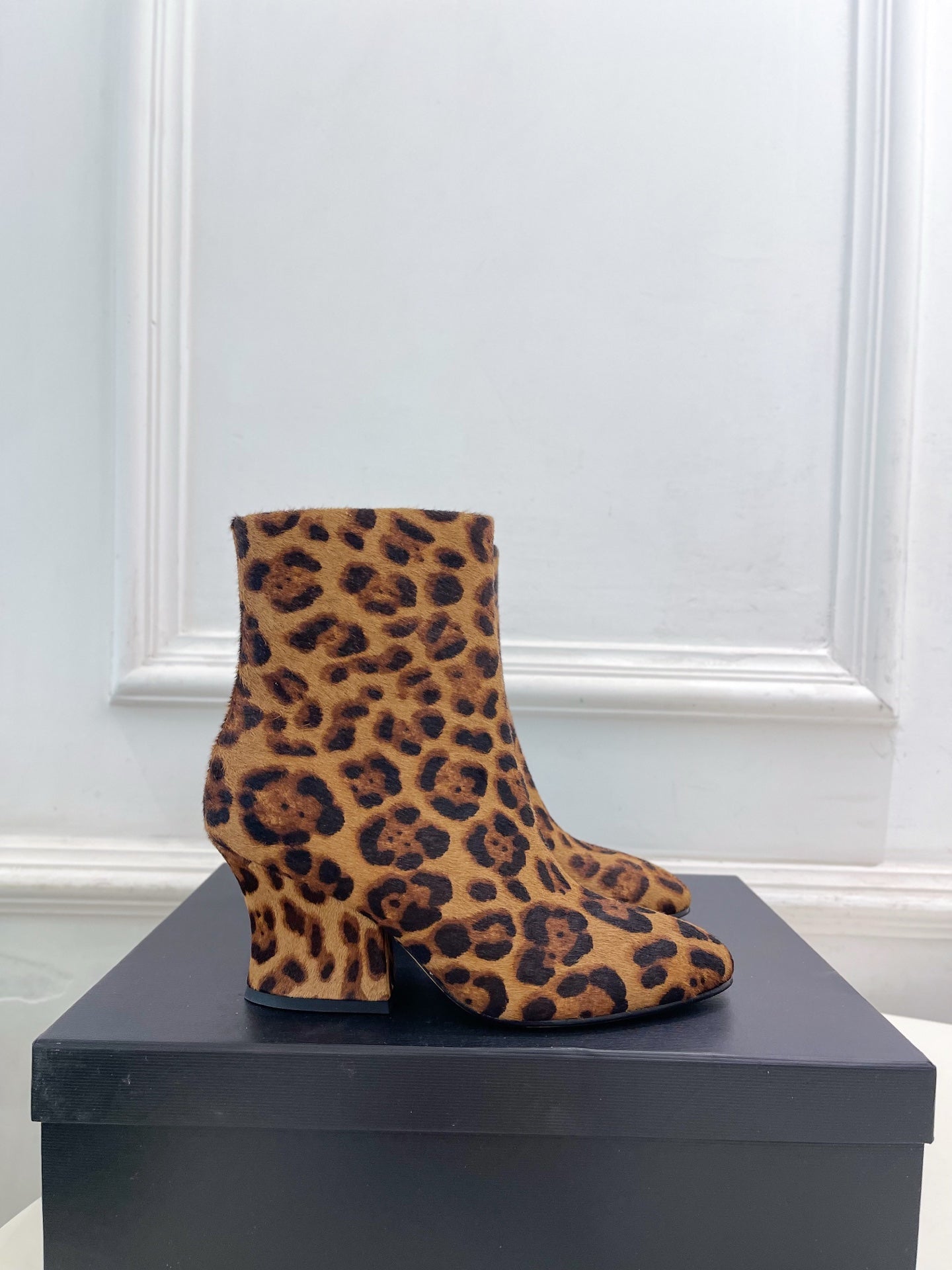 Jil Sander minimalist retro round-toe block-heel ankle boots in leopard print.