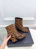 Jil Sander minimalist retro round-toe block-heel ankle boots in leopard print.