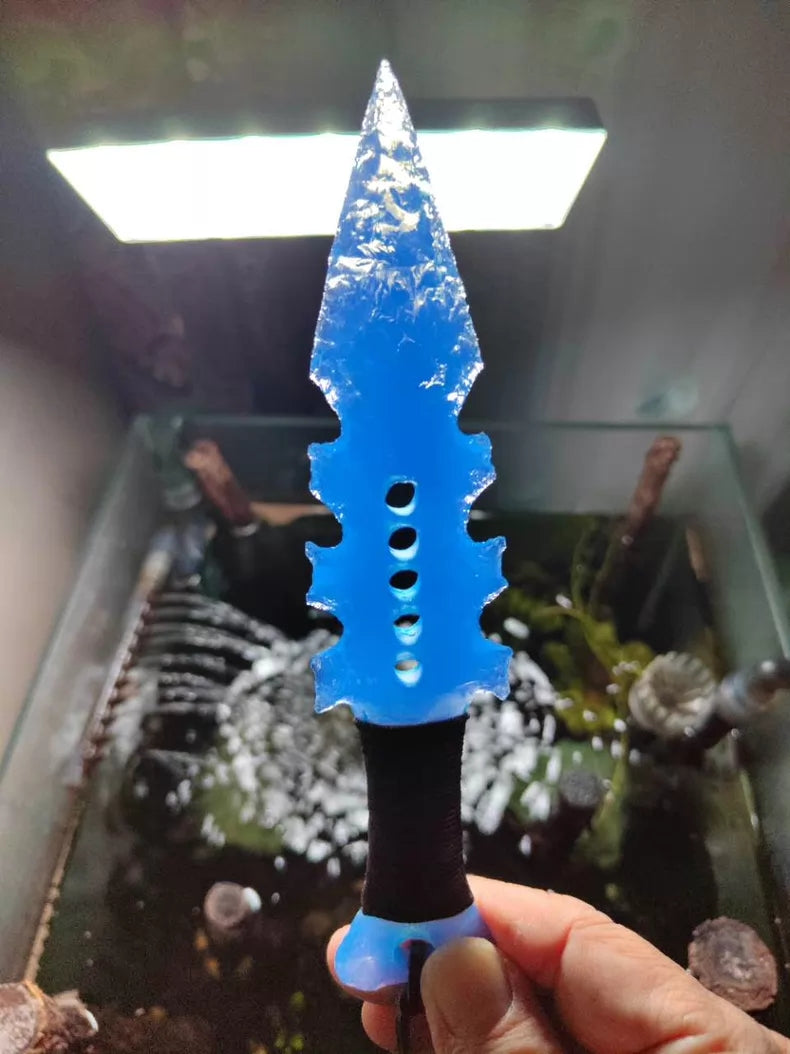 Tactical custom-forged stone-style knife; handcrafted custom knife with a unique blade shape and blue opal inlay; full-tang construction.