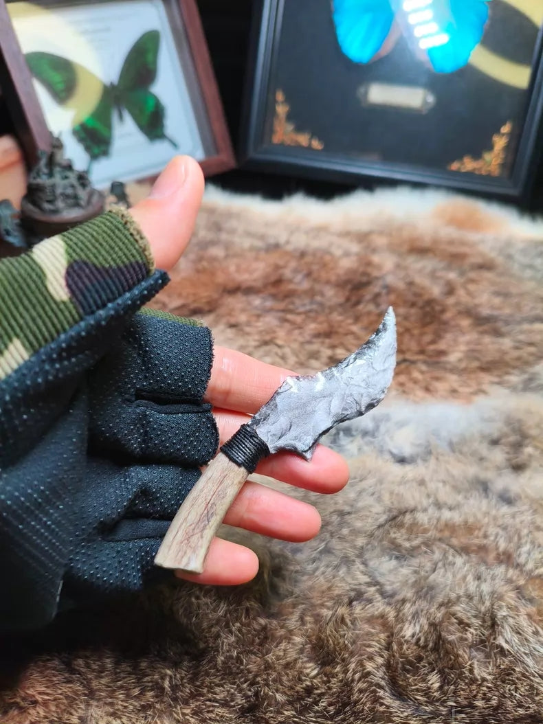 Hand-knapped stone knife for opening packages; uniquely shaped, premium silver sheen obsidian knife.