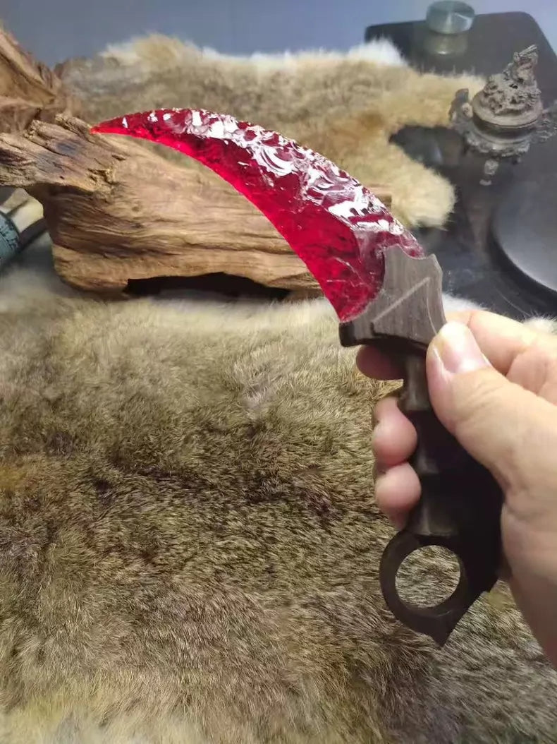 Chipped Stone Tool – Iridescent Ruby Karambit
