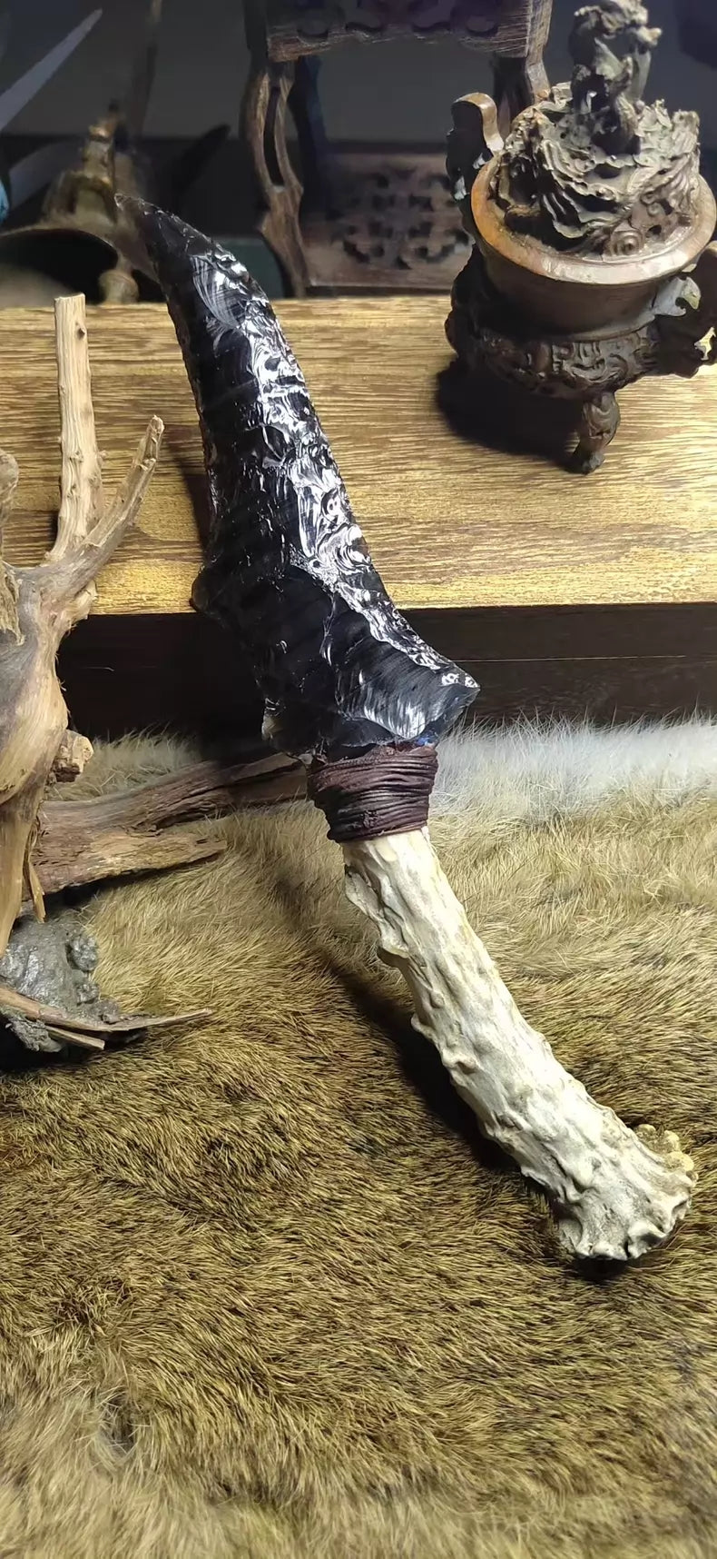 Chipped stone tool, stone knife, stone blade, obsidian knife, fine obsidian knife, hunting knife, primitive hunting knife.