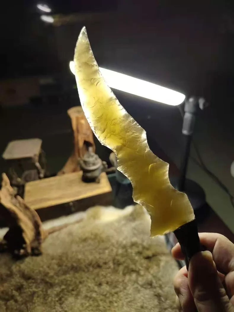 Knapped stone tools, stone knives, "Flame Blade," champagne-gold cat's-eye stone, dragon-crystal hunting knife, "Flame Blade," stone-bladed knife, obsidian knife, obsidian dragon-crystal blade — *Dragon Hunter: Gold Rush*