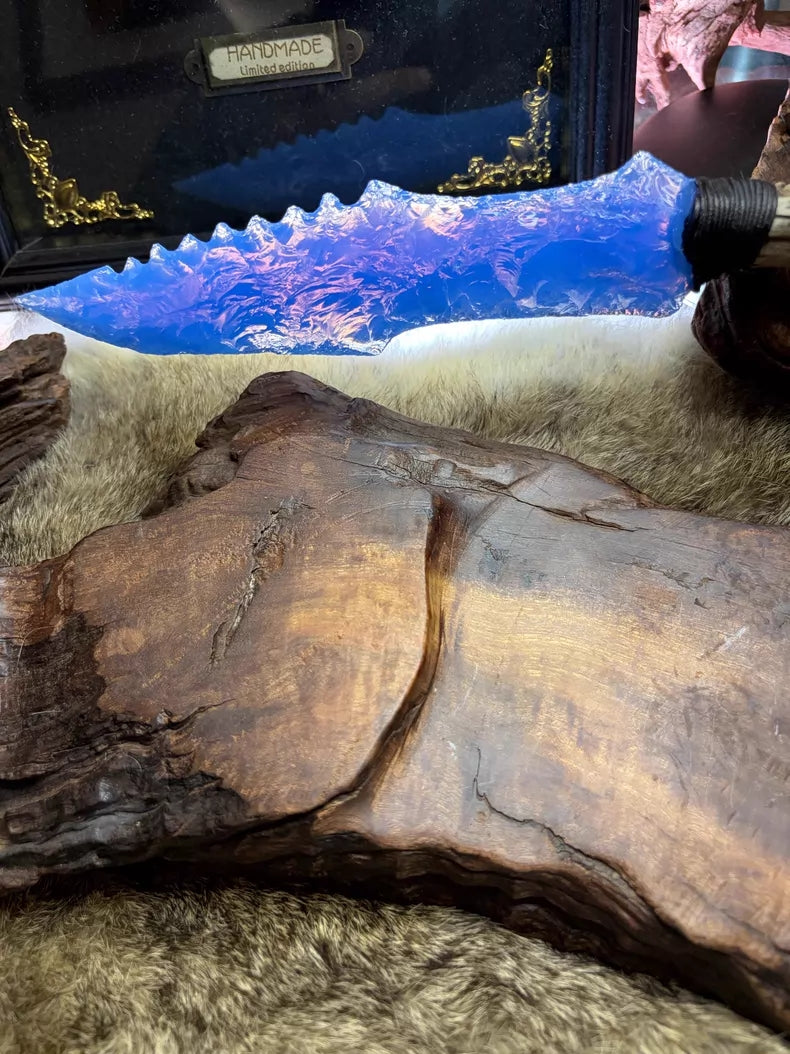 Knapped stone tools, stone knives, stone blades, hunter, blue opal knapped stone blade.