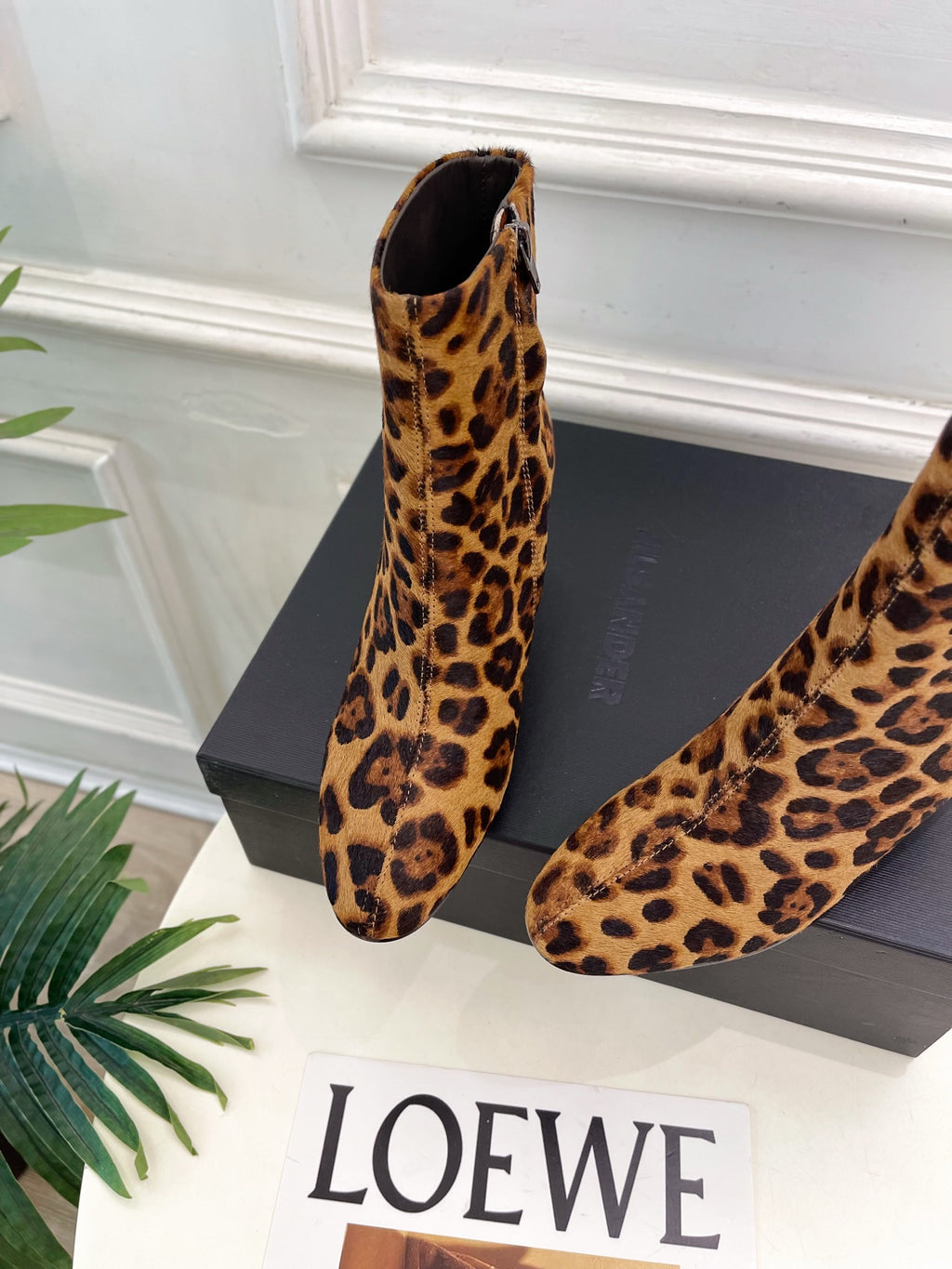 Jil Sander minimalist retro round-toe block-heel ankle boots in leopard print.