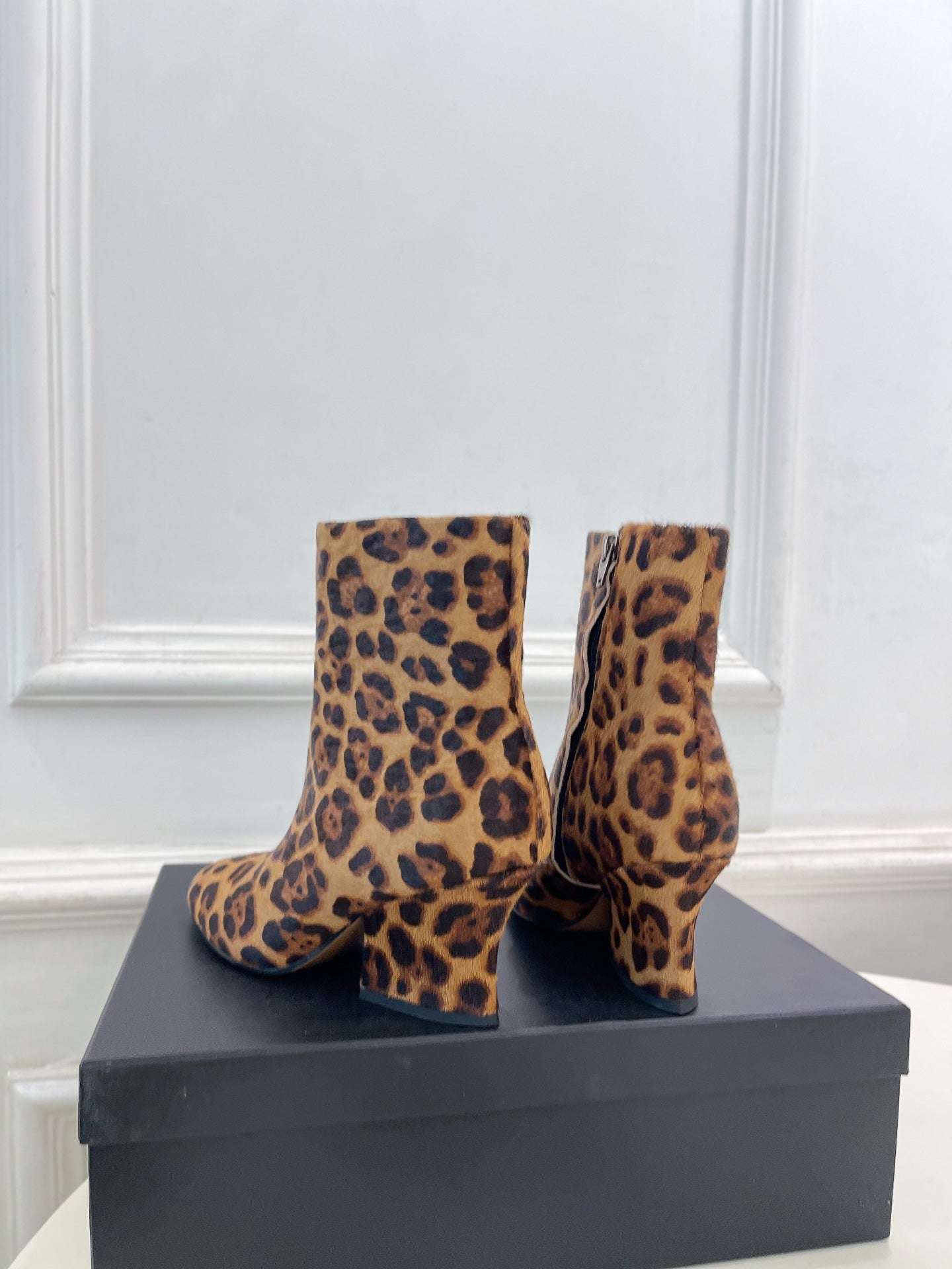 Jil Sander minimalist retro round-toe block-heel ankle boots in leopard print.