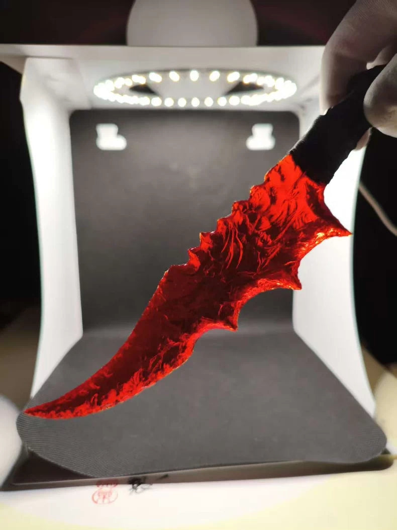 Knapped stone knives: red crystal knife, flame-shaped stone blade, obsidian knife, obsidian "Dragon Crystal" blade (*Zhu Xian: Red*)