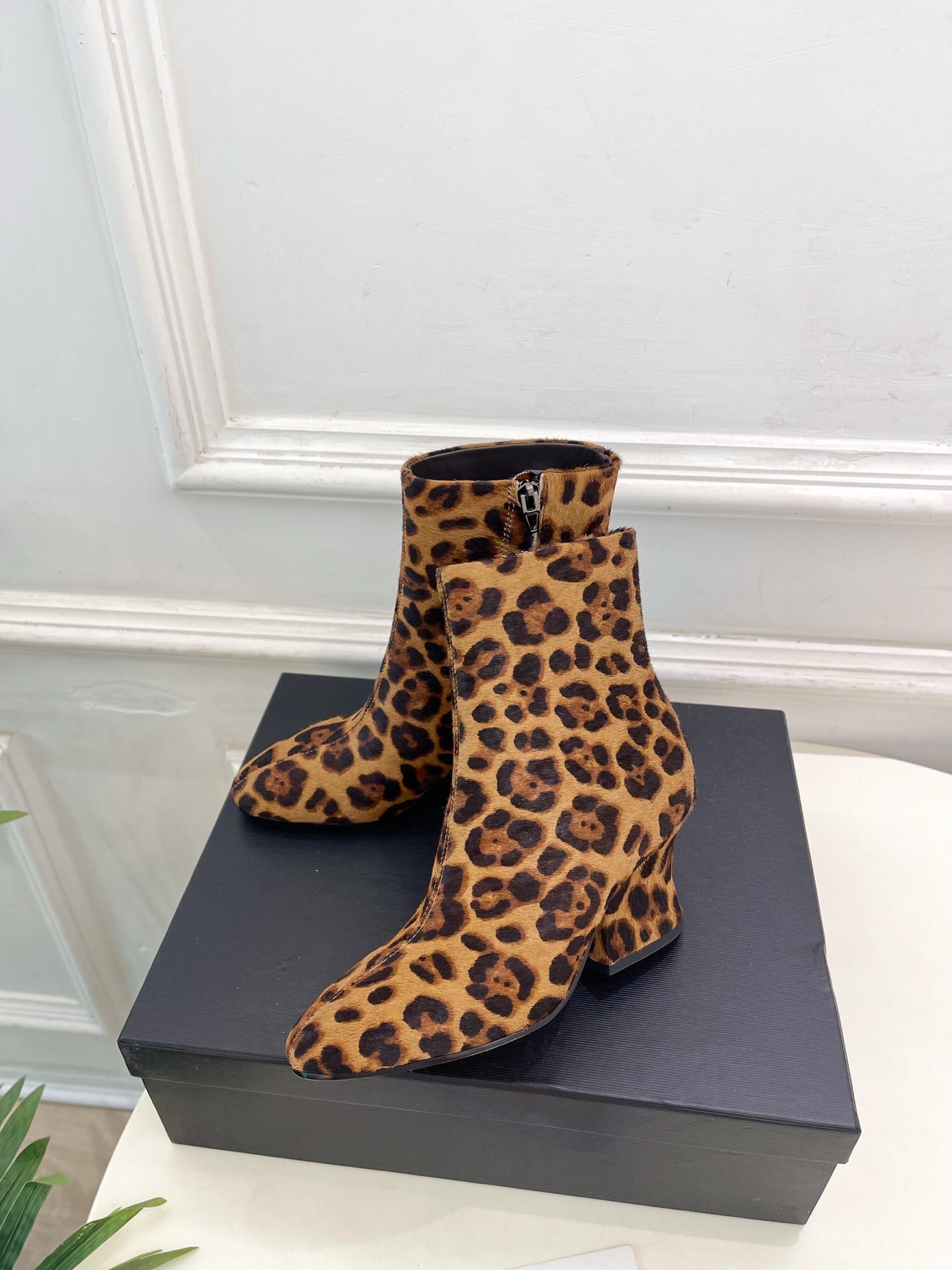 Jil Sander minimalist retro round-toe block-heel ankle boots in leopard print.