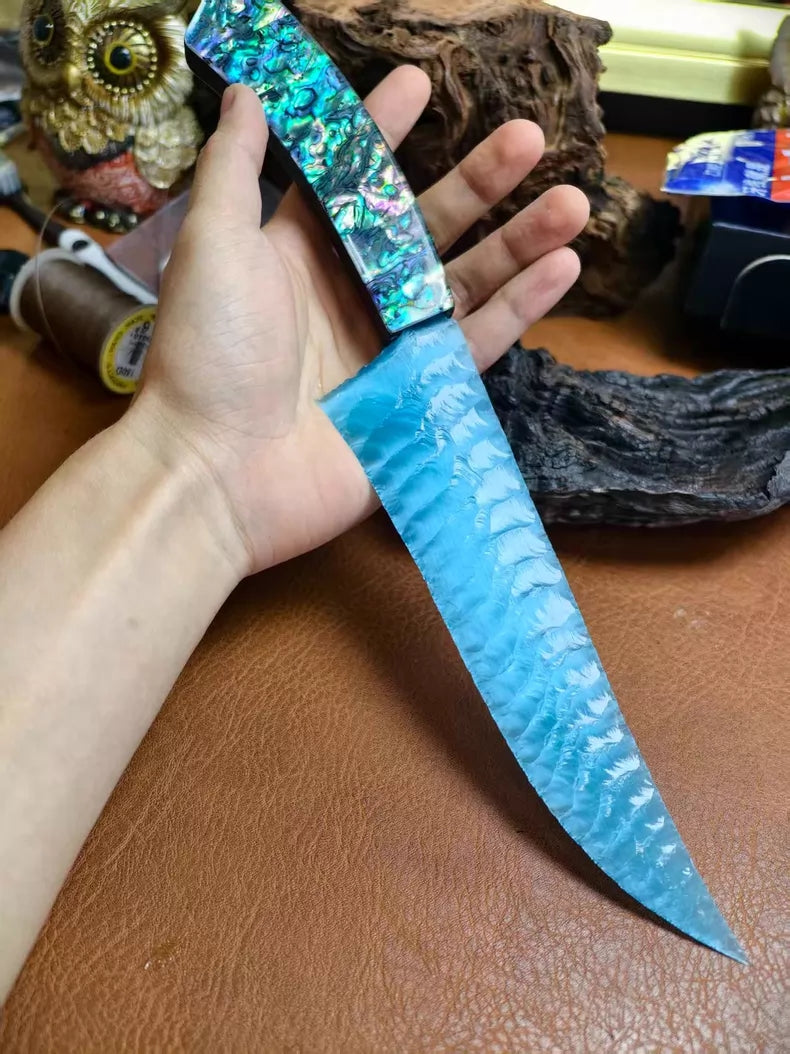 Flaked stone knife, pressure-flaked stone knife, hunting knife with a colorful shell handle and a sky-blue cat's-eye stone blade.