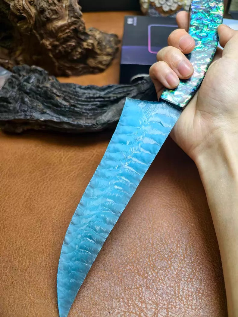 Flaked stone knife, pressure-flaked stone knife, hunting knife with a colorful shell handle and a sky-blue cat's-eye stone blade.