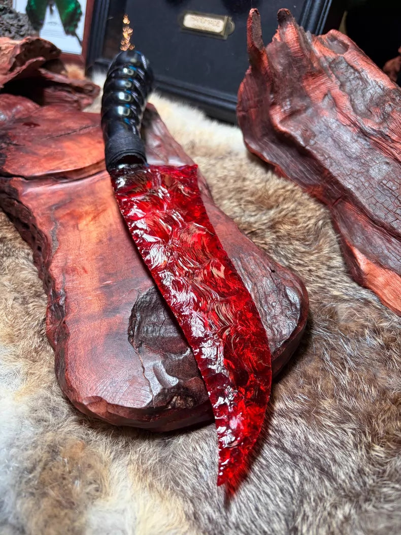 Knapped stone knife, red glass ancient-style hunting knife, flame-shaped stone blade, obsidian knife.