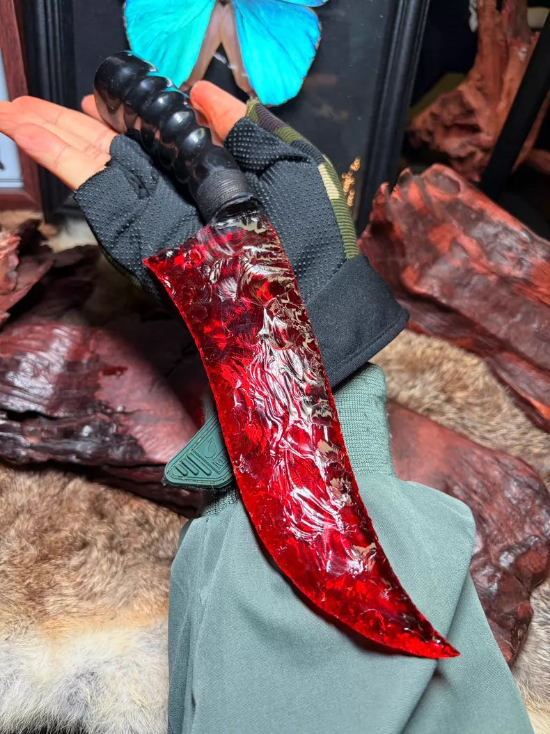 Knapped stone knife, red glass ancient-style hunting knife, flame-shaped stone blade, obsidian knife.