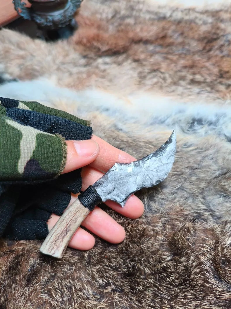 Hand-knapped stone knife for opening packages; uniquely shaped, premium silver sheen obsidian knife.