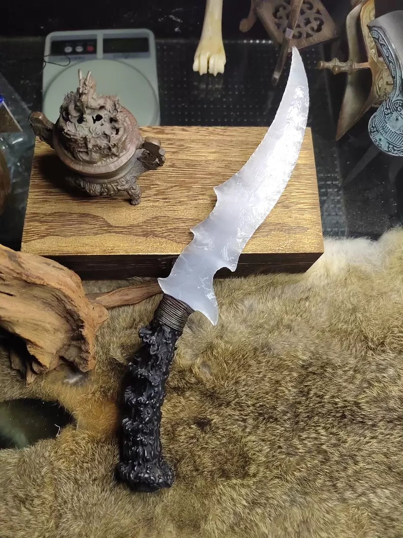 Chipped stone knife, silvery-white cat's-eye, silvery-white gemstone, flame-shaped stone blade, obsidian blade, obsidian "dragon-glass" treasure blade, "Ceremonial White Dragon"