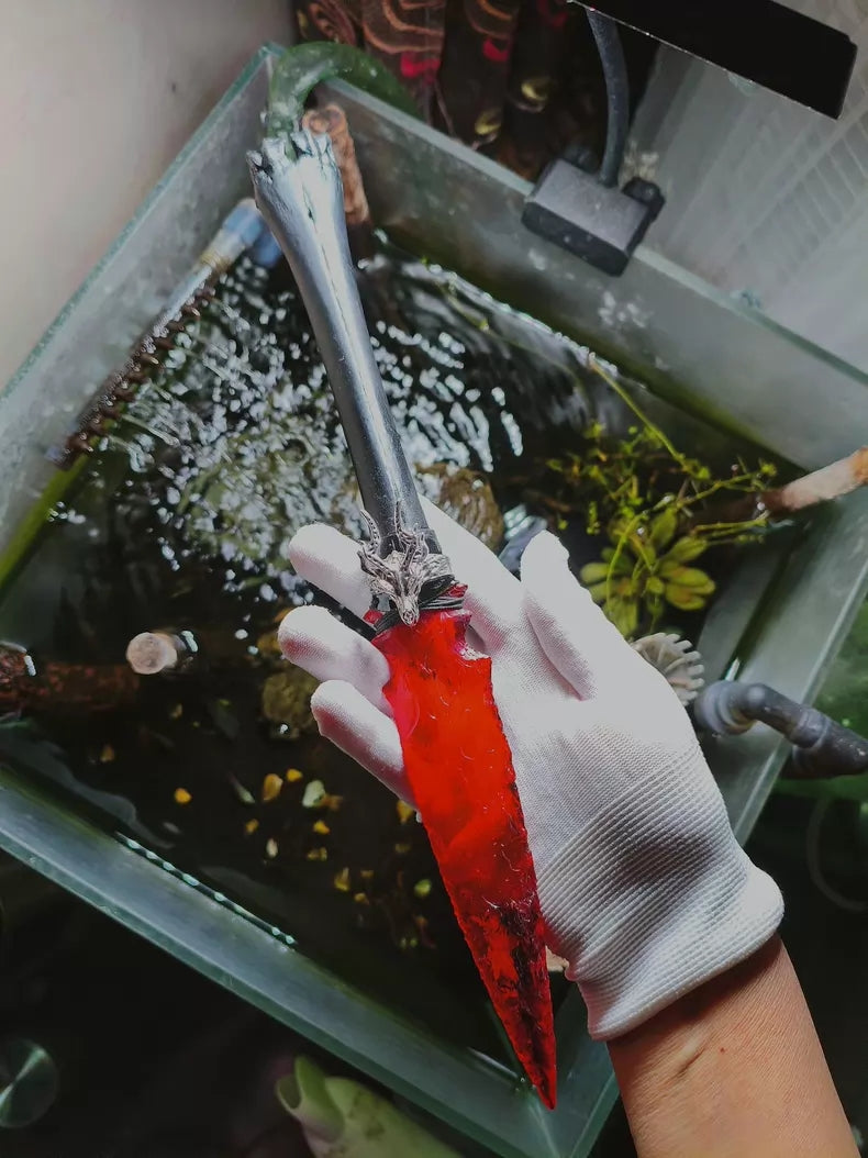 Knapped stone tool with red crystal and red glass; straight-edged stone knife/blade—new "War-Stab" series stone knife.