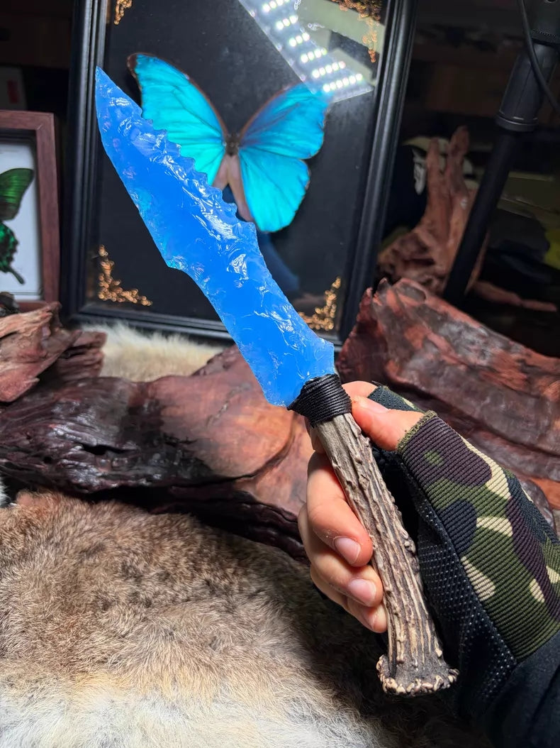 Knapped stone tools, stone knives, stone blades, hunter, blue opal knapped stone blade.