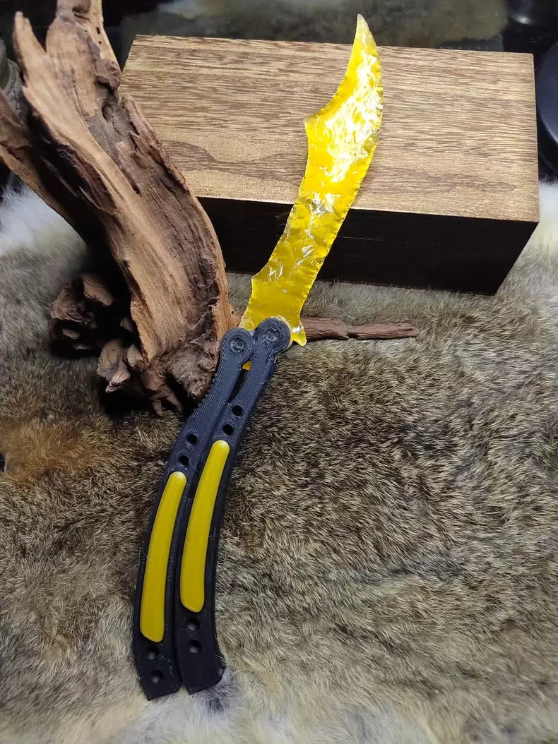 Chipped stone knife; CS:GO butterfly knife style; crafted from golden cat's-eye stone.