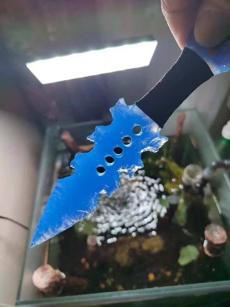 Tactical custom-forged stone-style knife; handcrafted custom knife with a unique blade shape and blue opal inlay; full-tang construction.