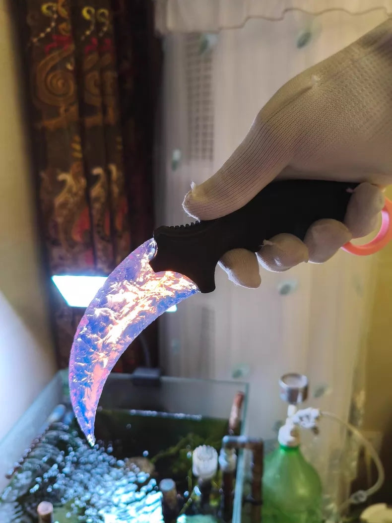 Chipped-style CS:GO Karambit with a pink opal-style 3D-printed handle; dreamy pink Karambit.