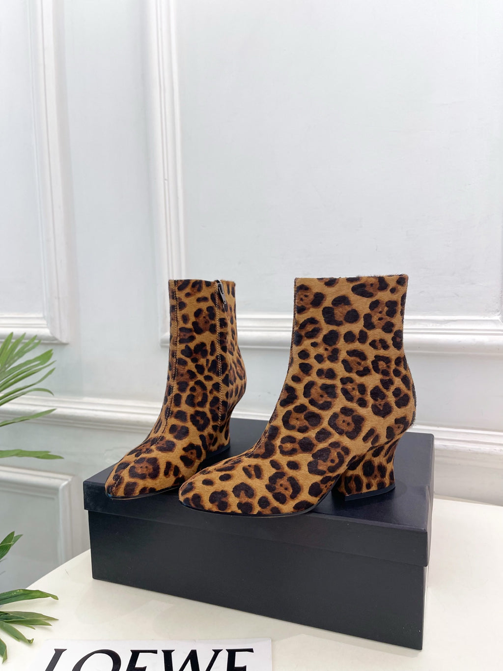 Jil Sander minimalist retro round-toe block-heel ankle boots in leopard print.